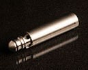 A turned fuel injector component that contains very detailed features incluing very precise angular bores.