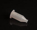 This is a dispensing nozzle cut from a solid piece of plastc stock that is translucent.  For larger images see the slideshow.